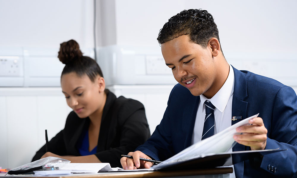 Sixth Form students working in Class